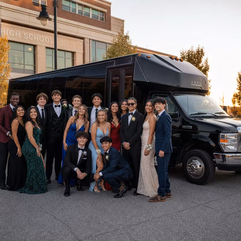 Group boarding a white charter bus for Prom & Homecoming Transportation transportation in Chicago