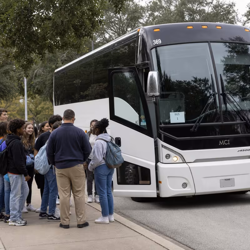 Black Mercedes Sprinter van staged for an Chicago School Transportation group