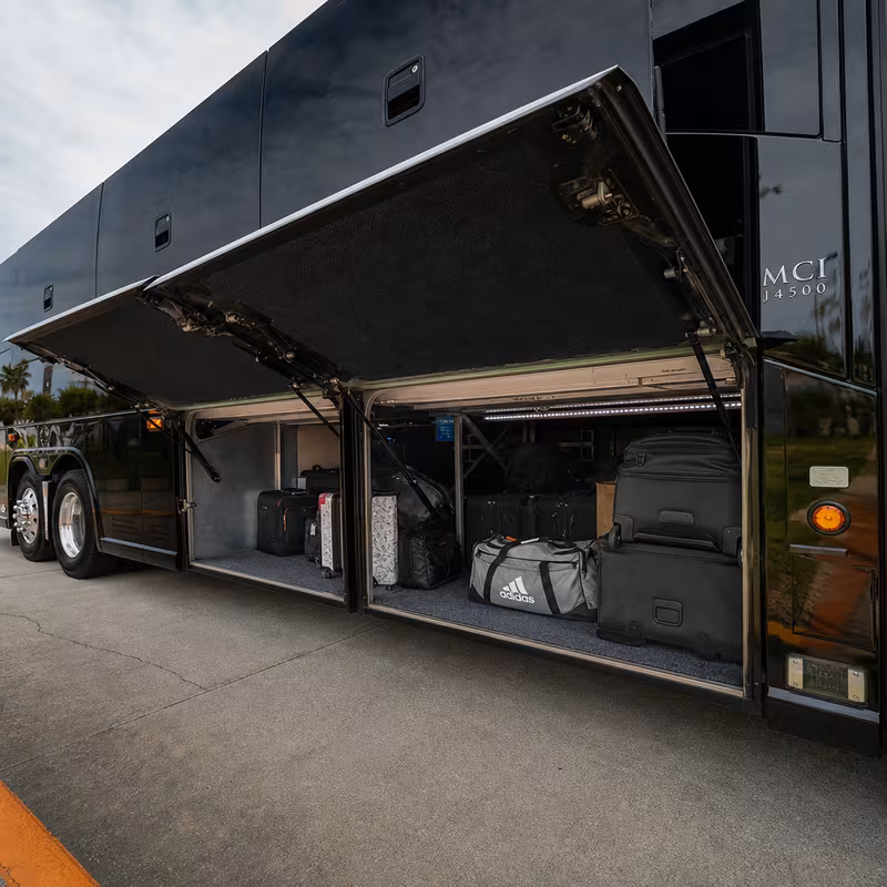 Party bus interior with wraparound leather seating and LED lighting in Chicago